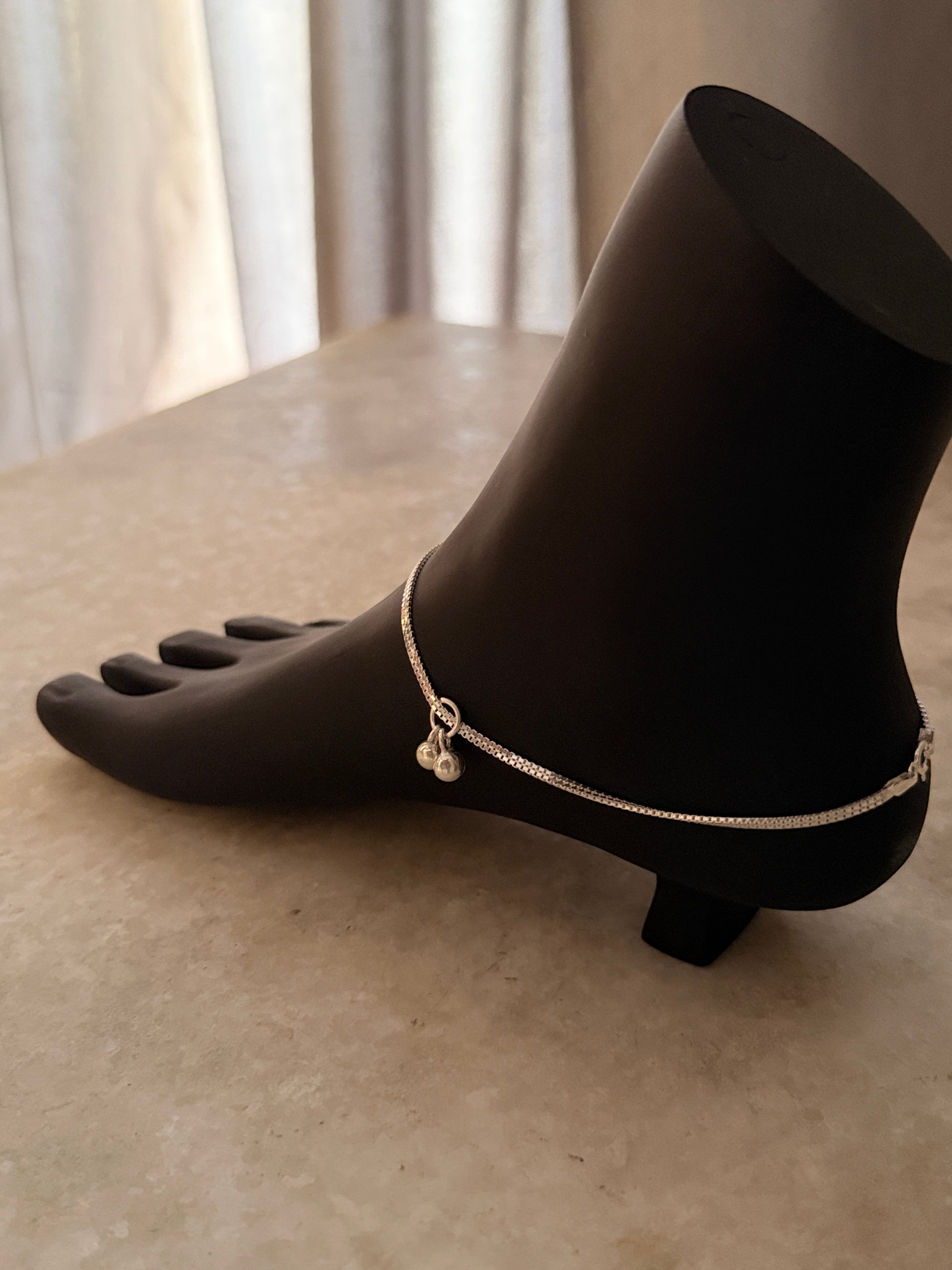 Polished flat box chain anklet crafted in sterling silver