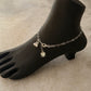 Elegant sterling silver anklet featuring heart chain links  