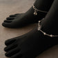 Delicate silver anklet featuring a divine lotus motif 