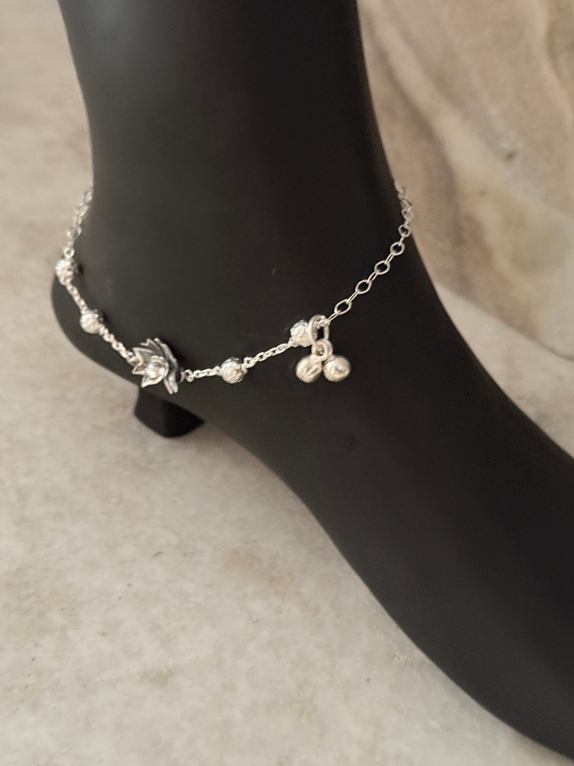Symbolic lotus flower anklet representing purity and grace  