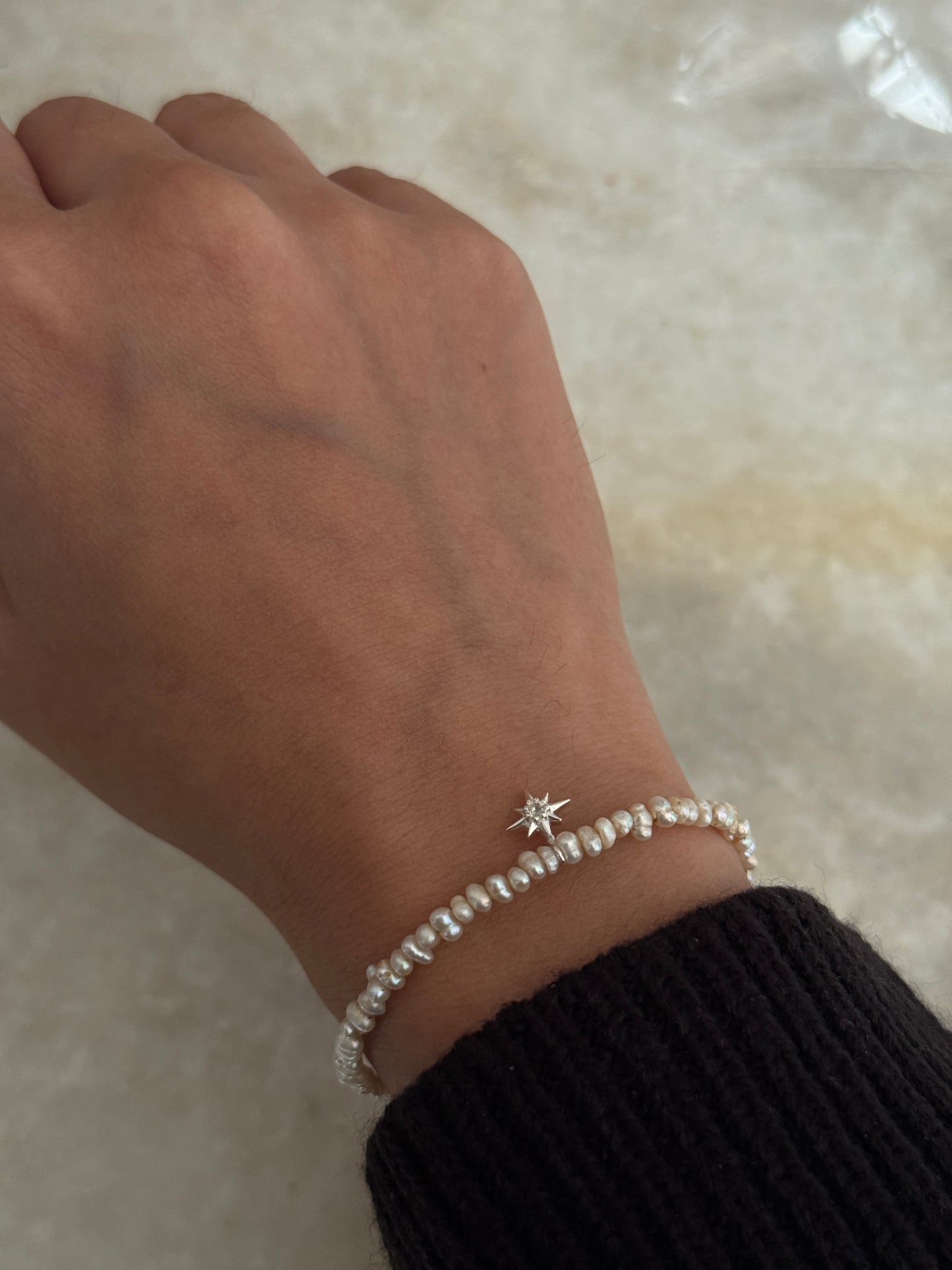Delicate Basra pearl bracelet with sparkling white topaz North Star