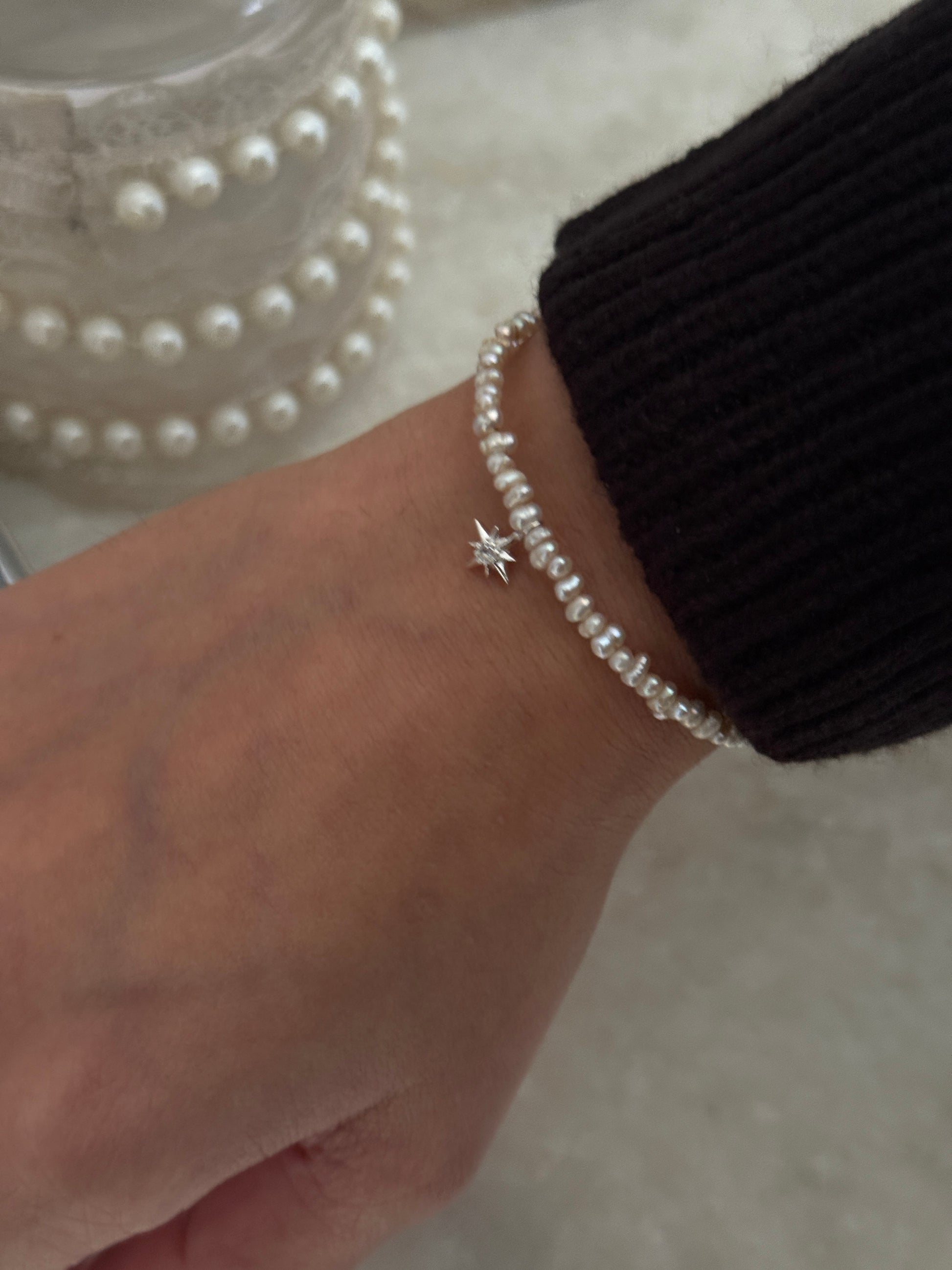 Elegant Basra pearl and white topaz North Star silver bracelet