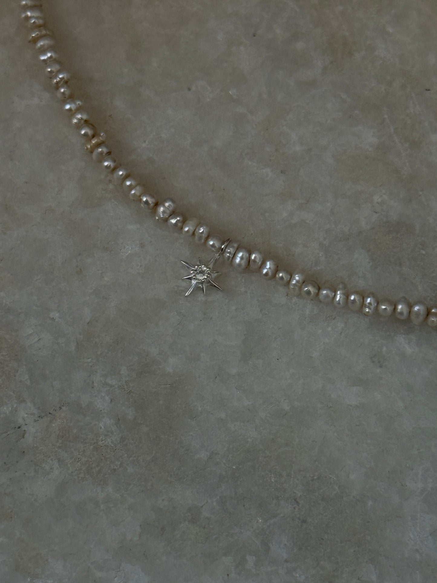 Fresh water pearl Basra bracelet with North Star white topaz charm