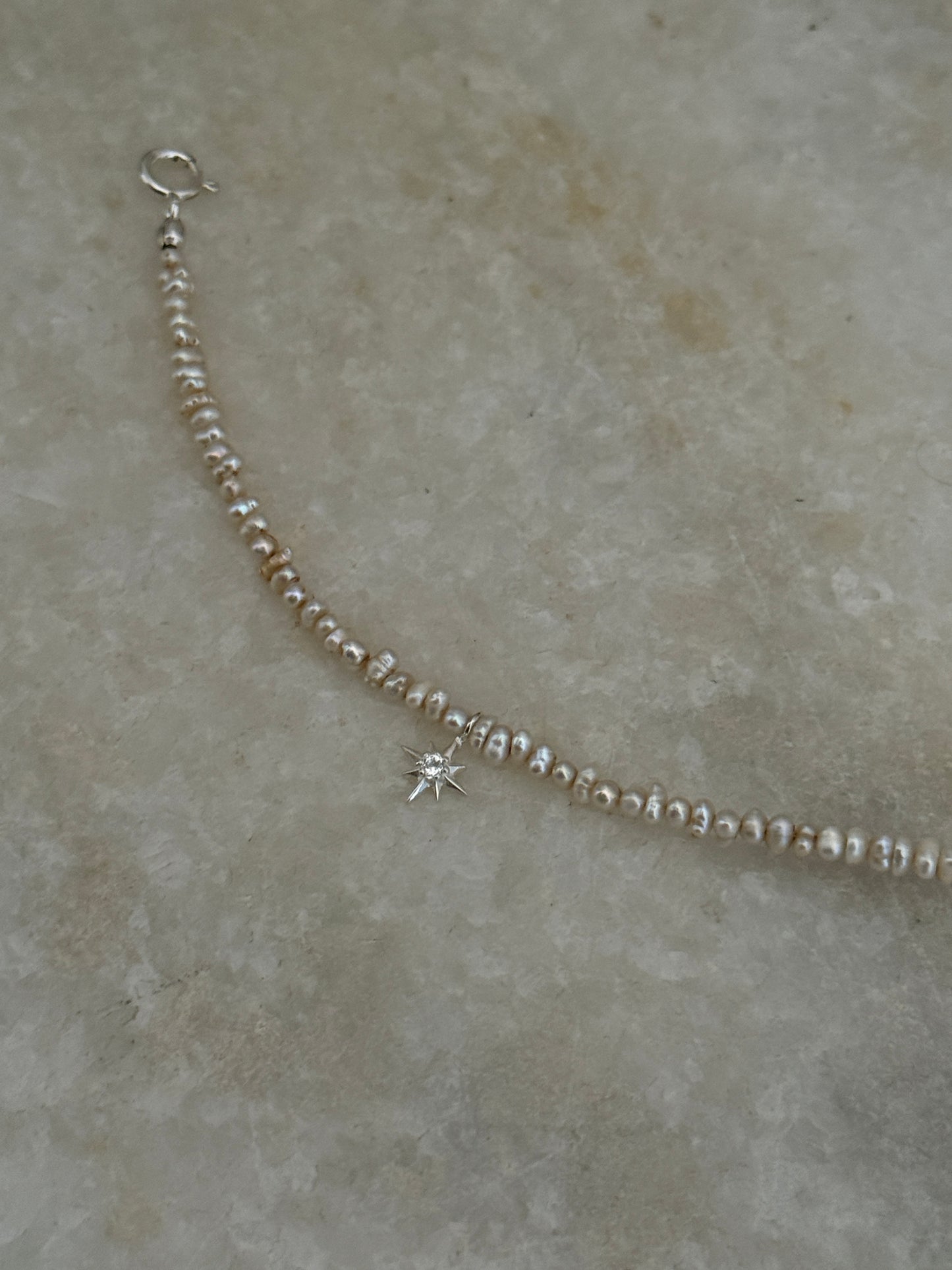 Natural Basra pearls with North Star white topaz in 925 silver