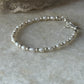 Dainty freshwater pearl and silver bead bracelet