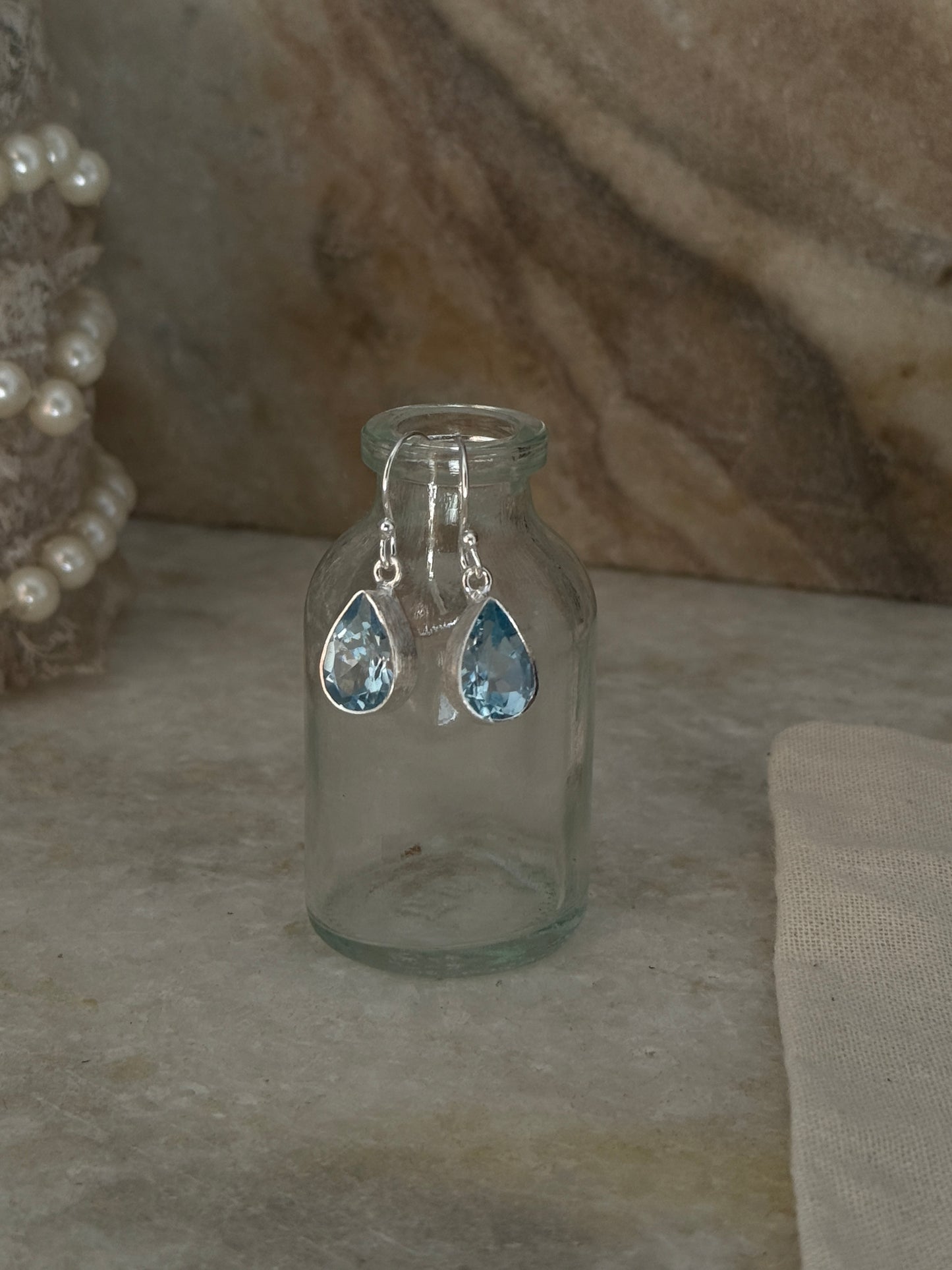 Handcrafted blue topaz plain pear sterling silver earrings