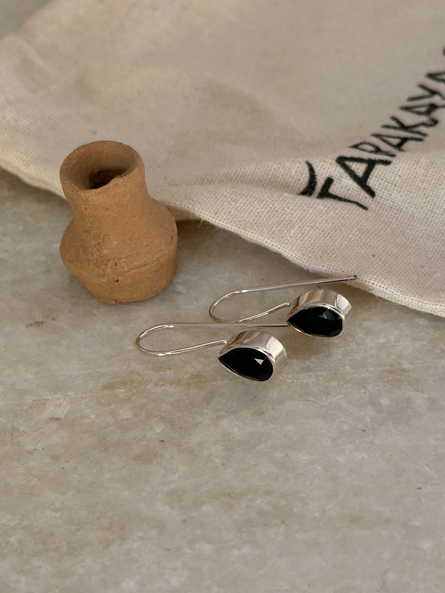 Faceted black onyx pear gemstone hook earrings