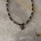 925 Sterling silver artisan necklace with marijuana charm, smokey quartz, and emerald  