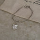 925 Sterling silver paper clip chain bracelet featuring frangipani pendant