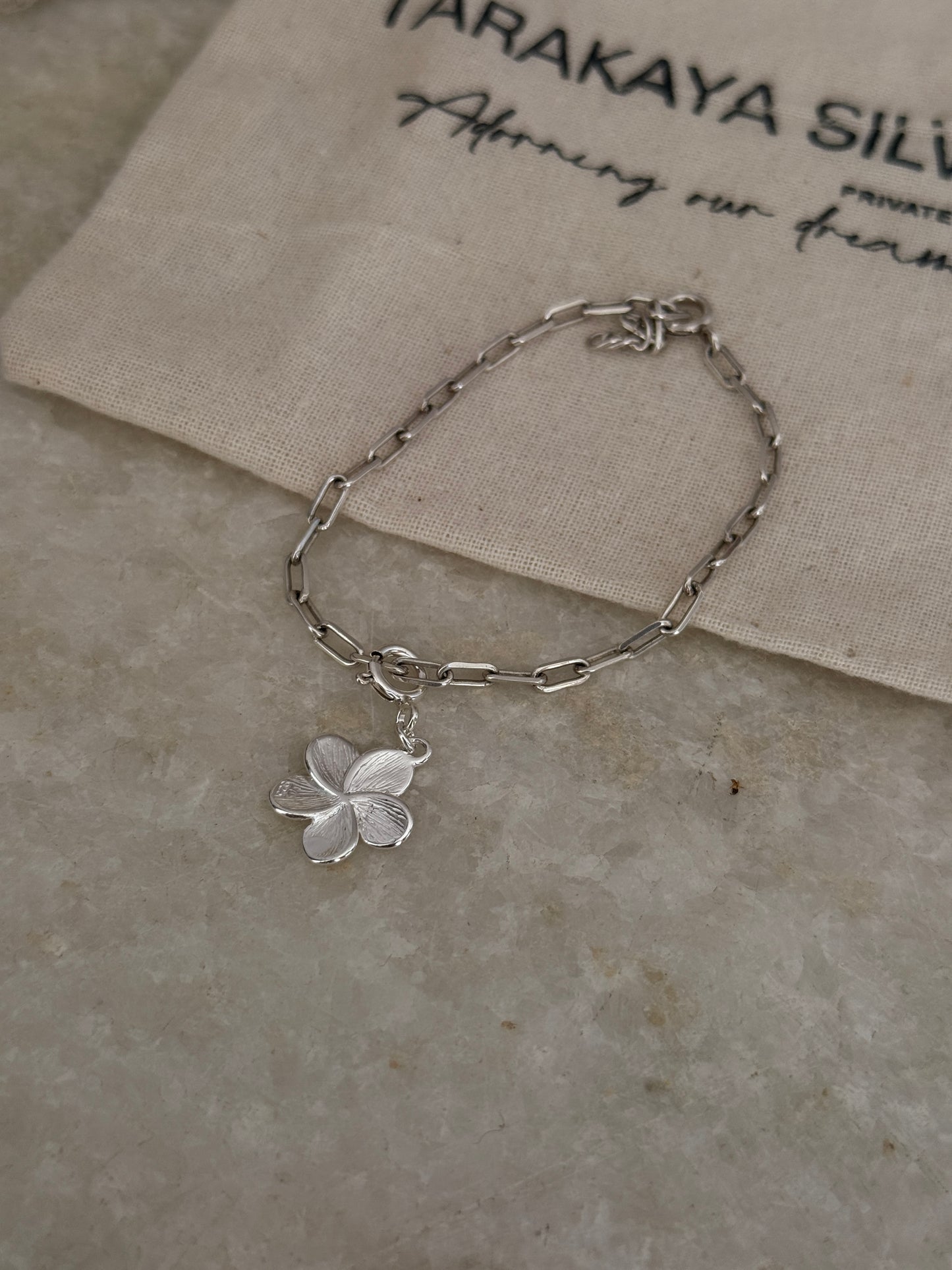 925 Sterling silver paper clip chain bracelet featuring frangipani pendant