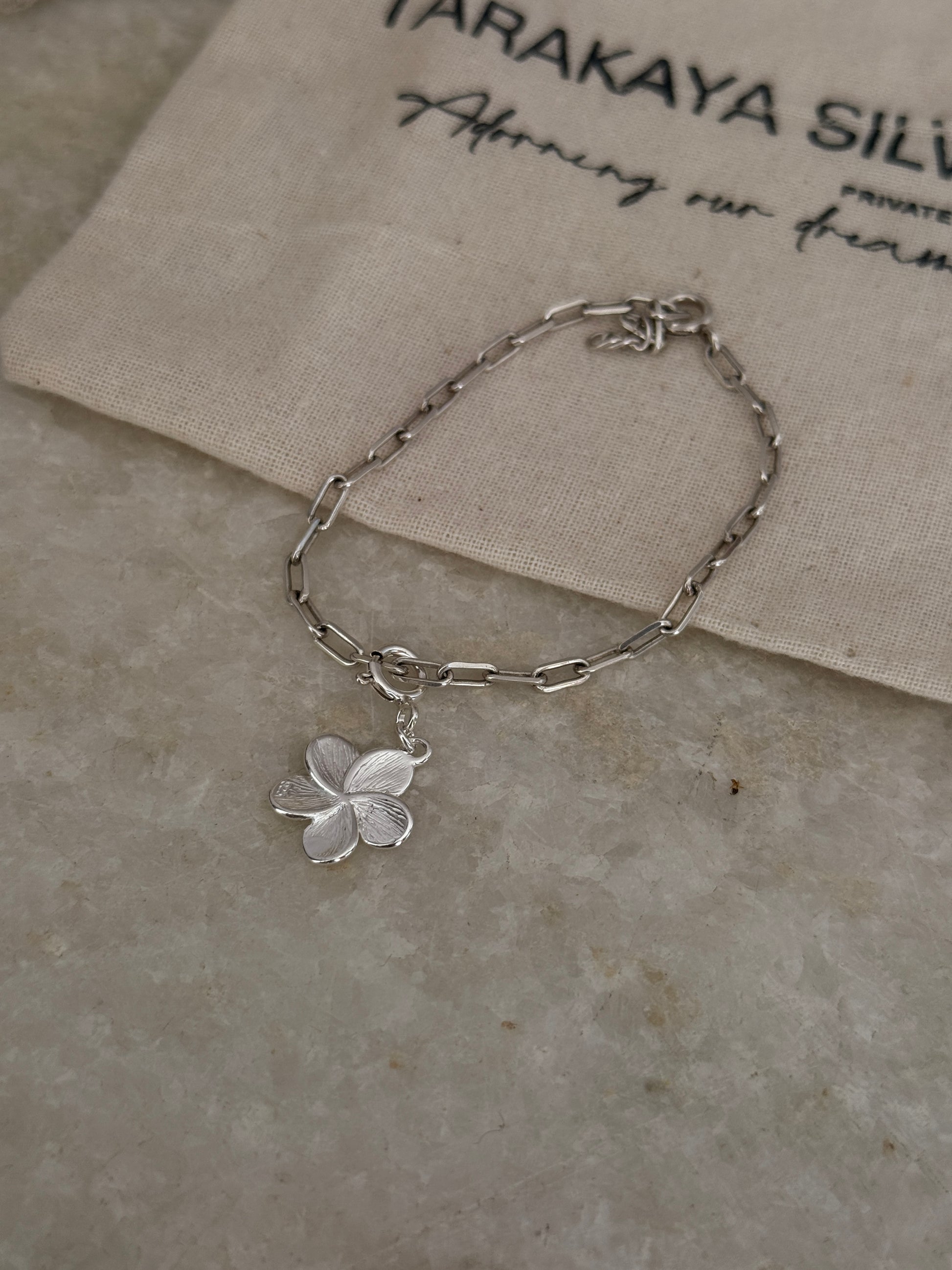 925 Sterling silver paper clip chain bracelet featuring frangipani pendant