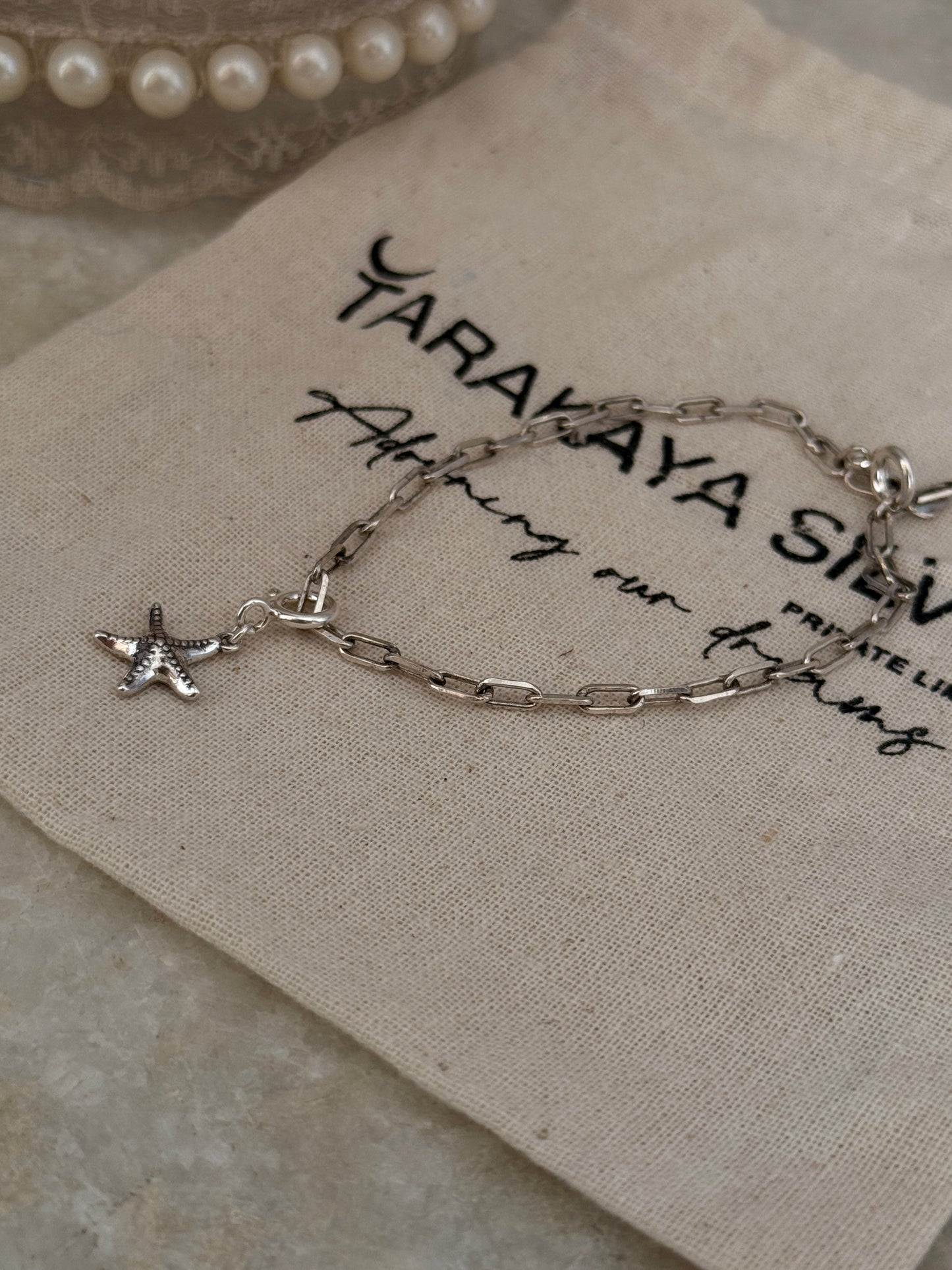 925 Sterling silver paper clip chain bracelet featuring starfish pendant
