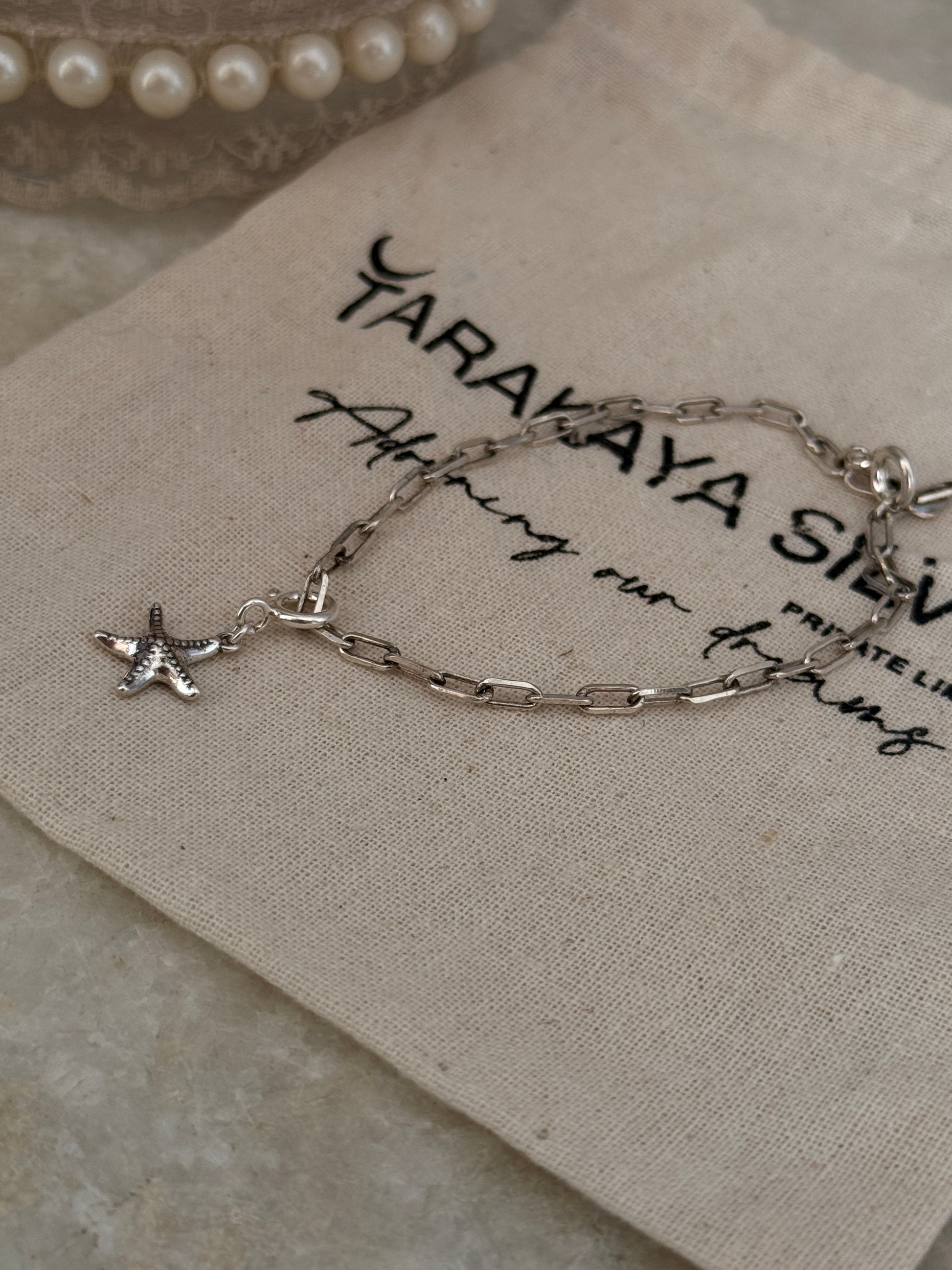 925 Sterling silver paper clip chain bracelet featuring starfish pendant