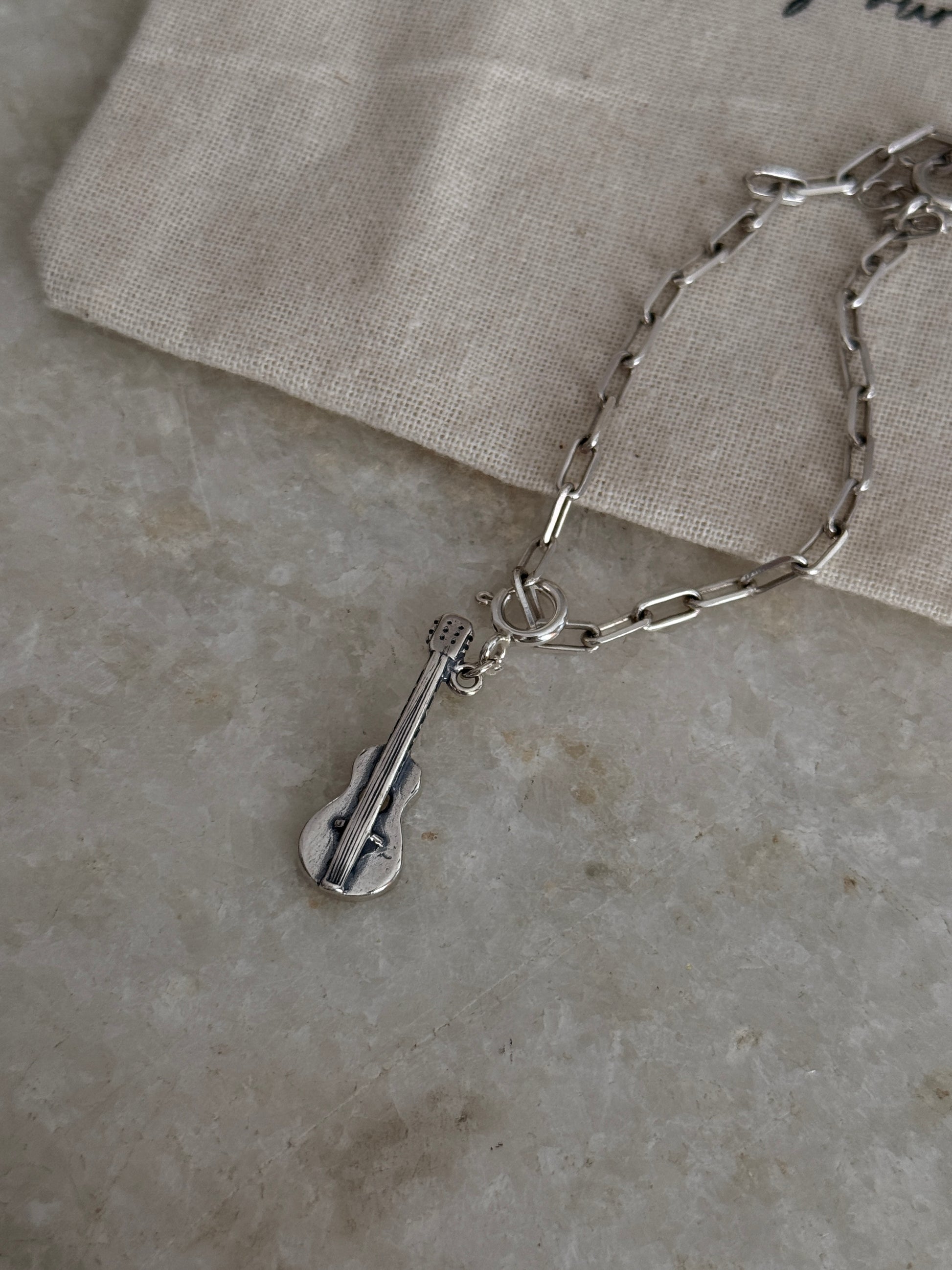 925 Sterling silver paper clip chain bracelet featuring guitar pendant