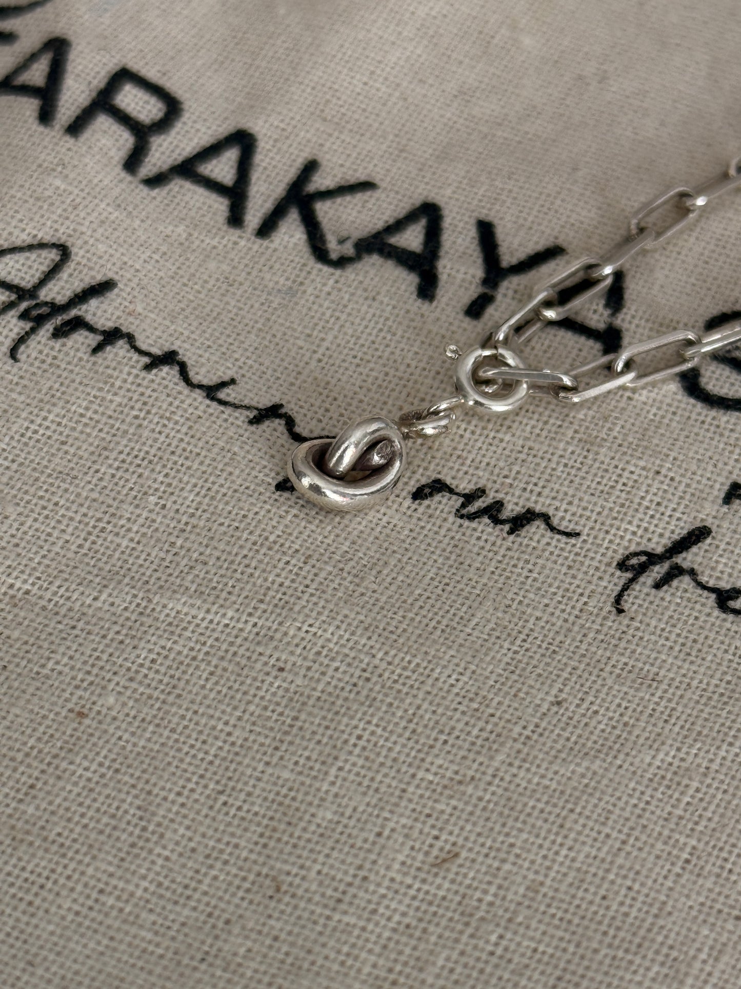 Handcrafted 925 Sterling silver promise knot charm paper clip bracelet