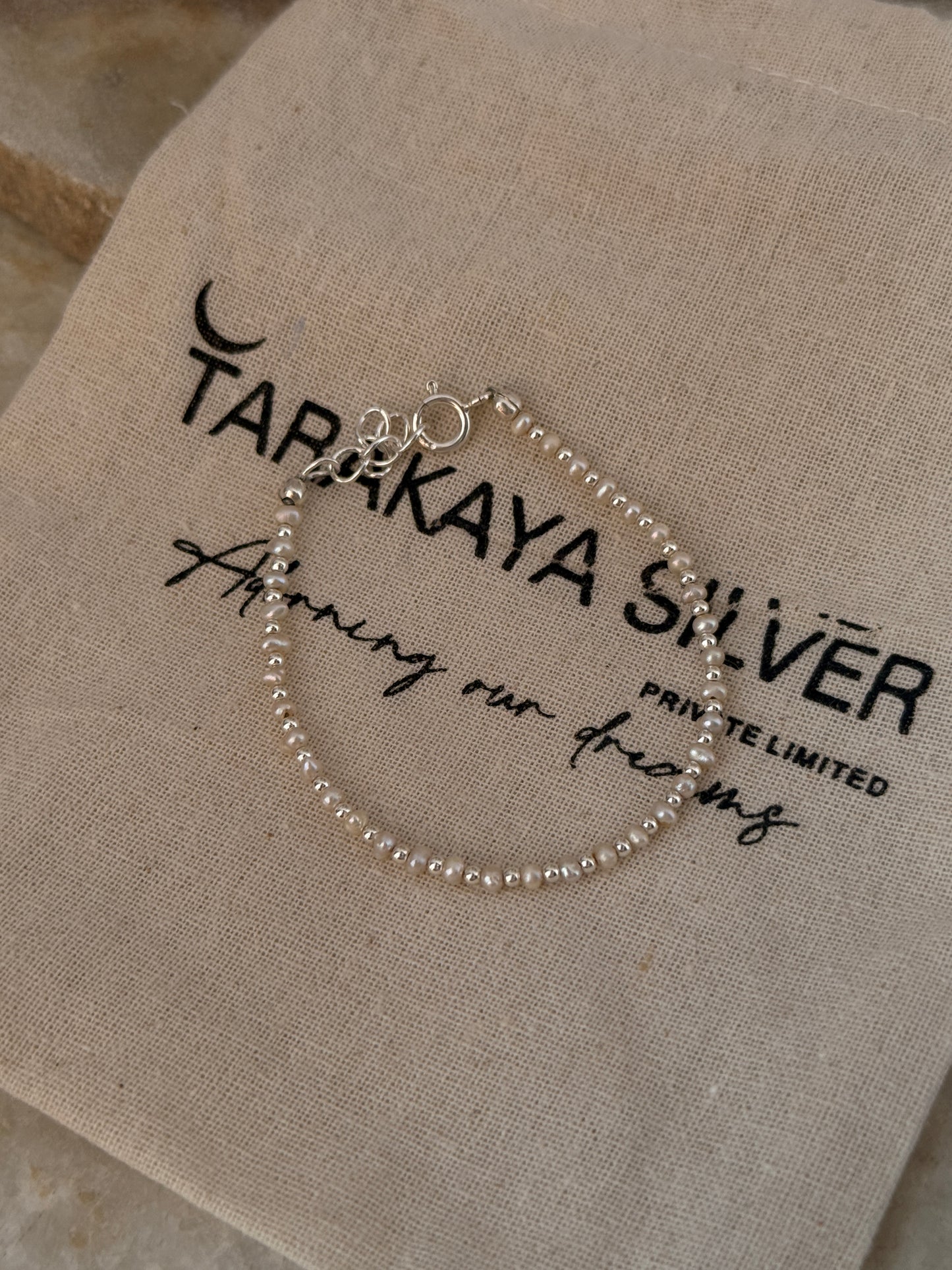 925 Sterling silver bracelet featuring warm tone freshwater pearls and 2mm beads