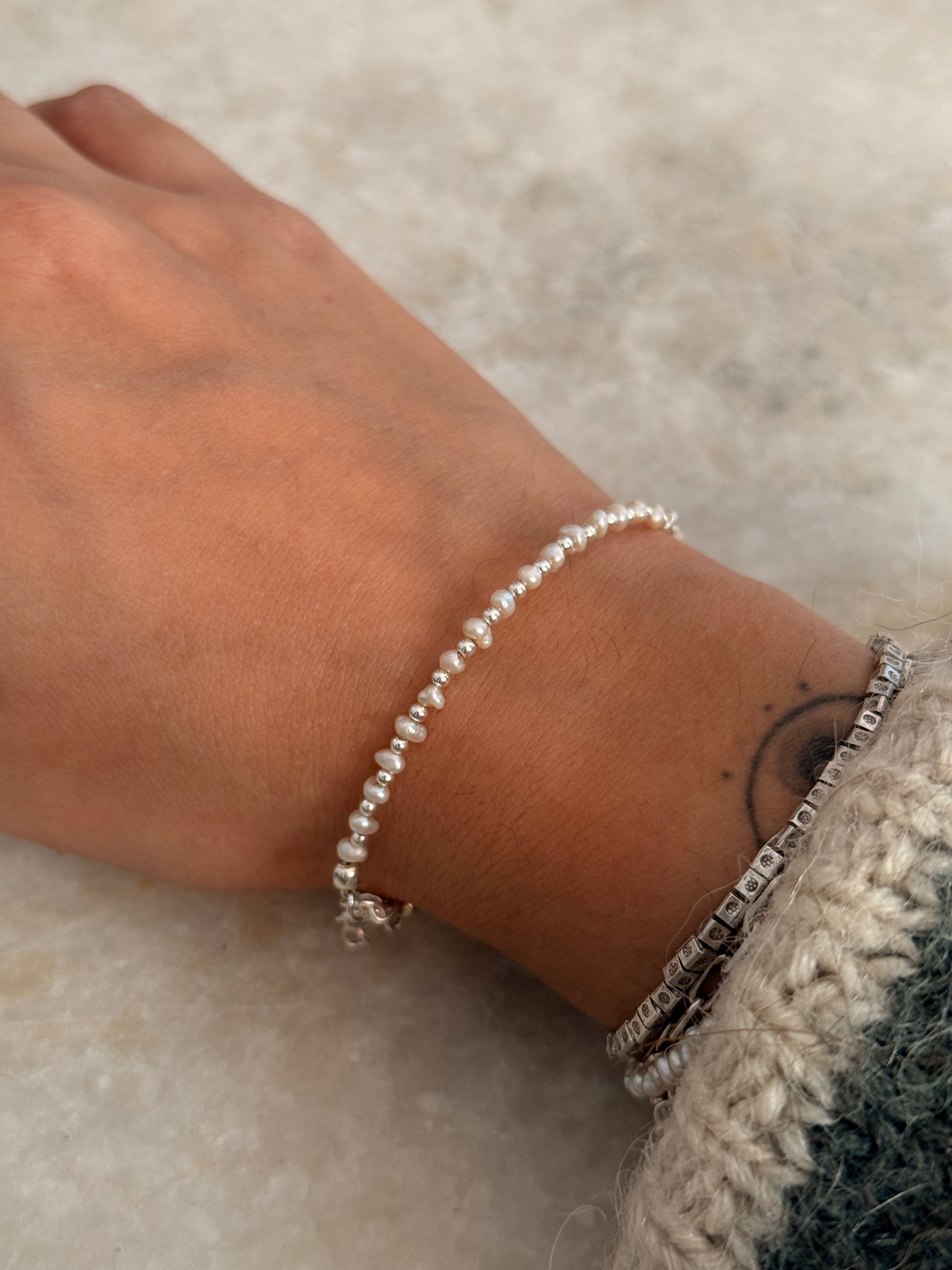 925 Sterling silver bracelet featuring warm tone freshwater pearls and 2mm beads