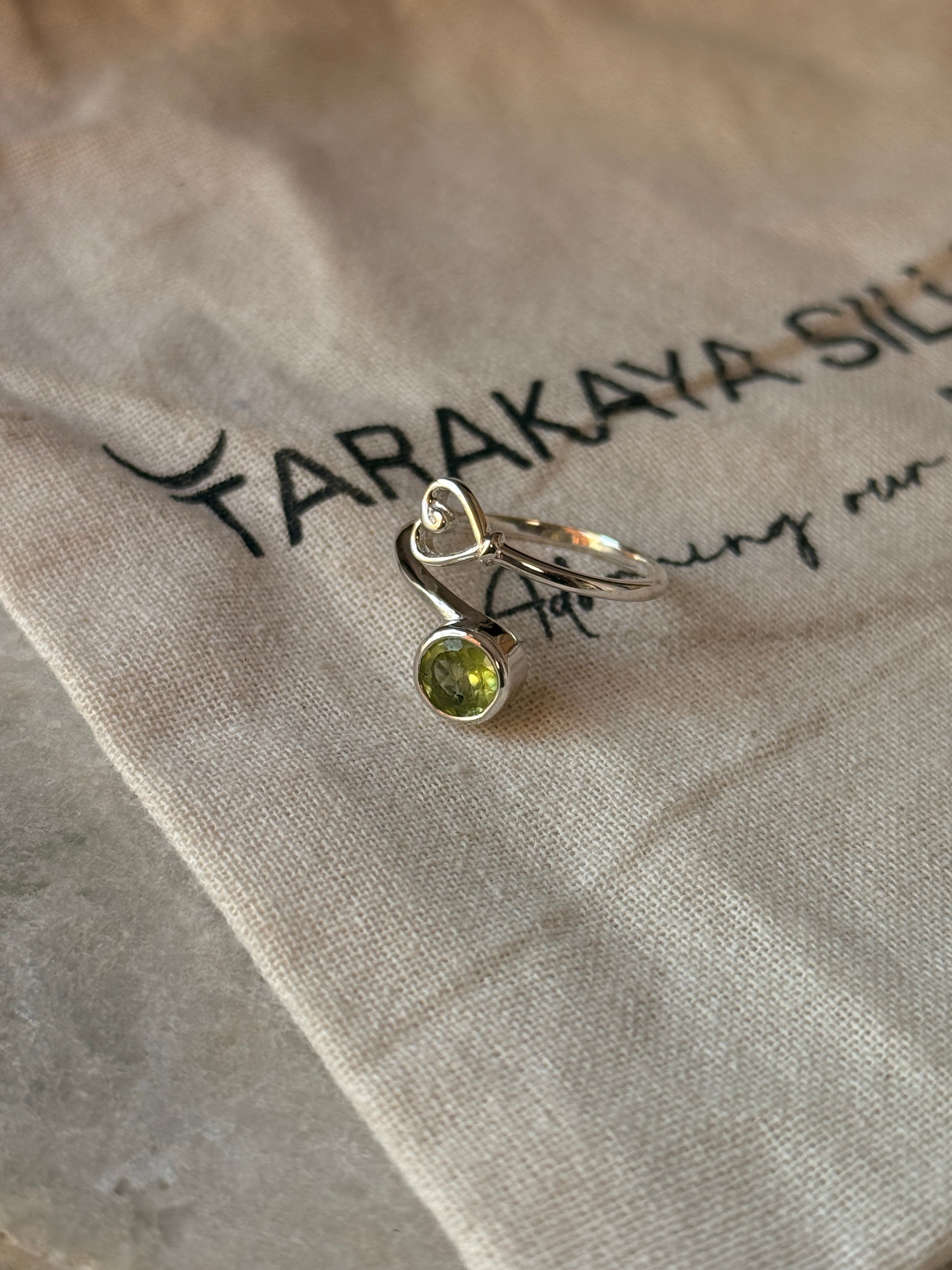 Artisan crafted peridot round heart adjustable 925 sterling silver ring