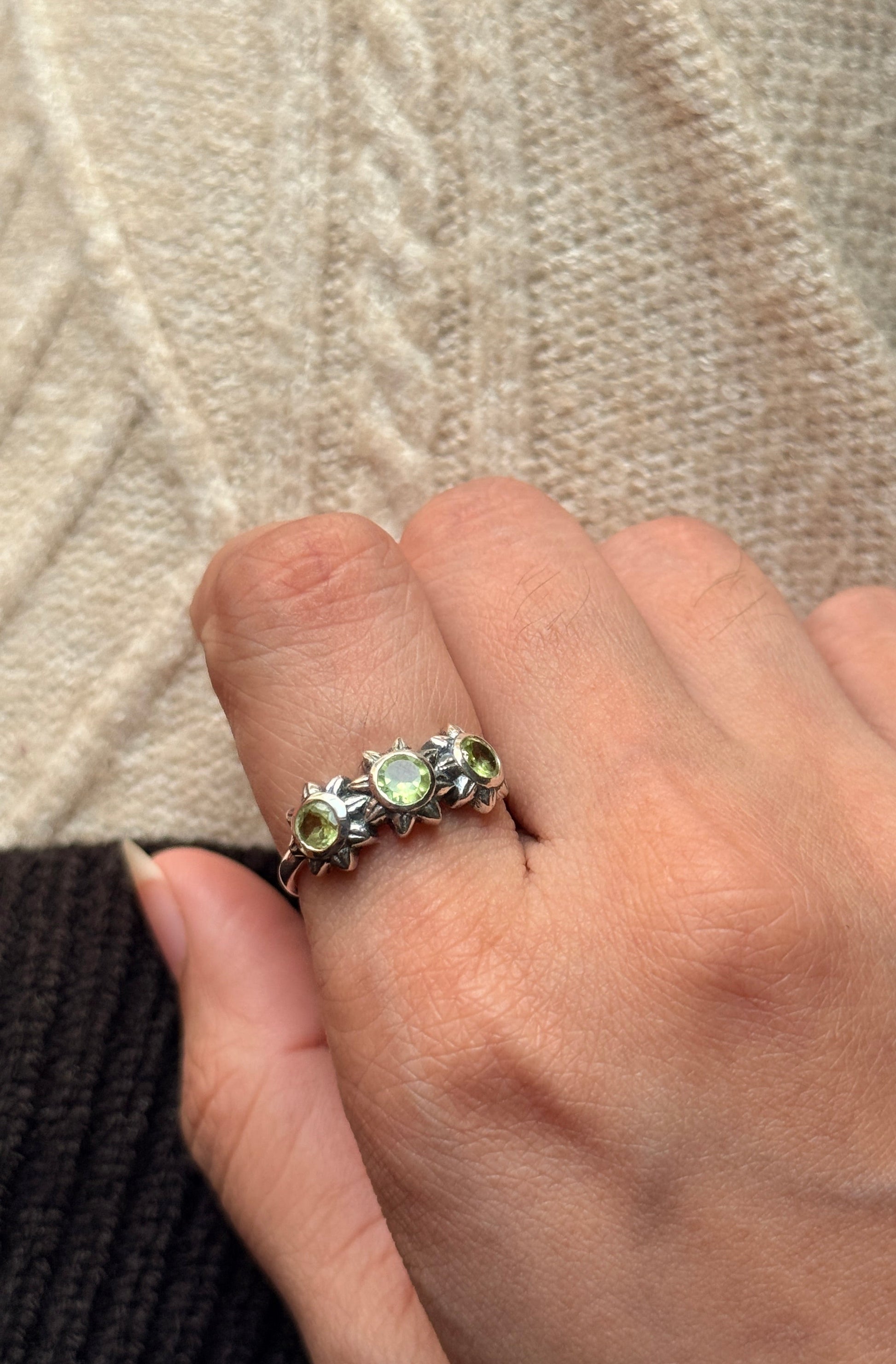 Artisan crafted peridot three flower 925 sterling silver ring
