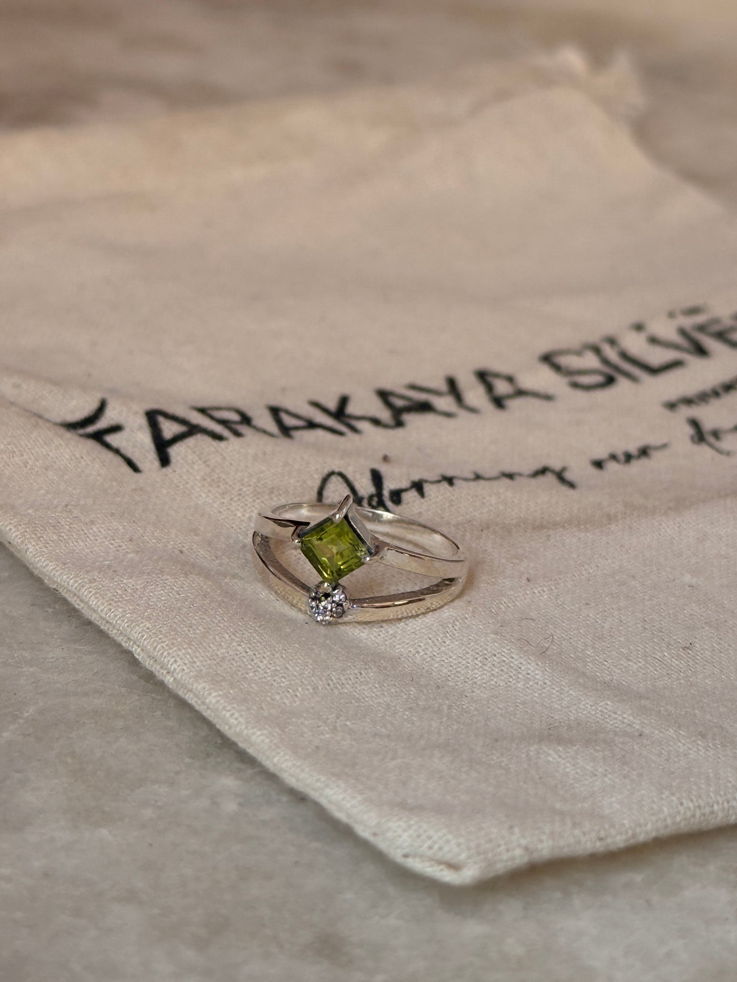 Artisan crafted peridot and white topaz 925 sterling silver ring