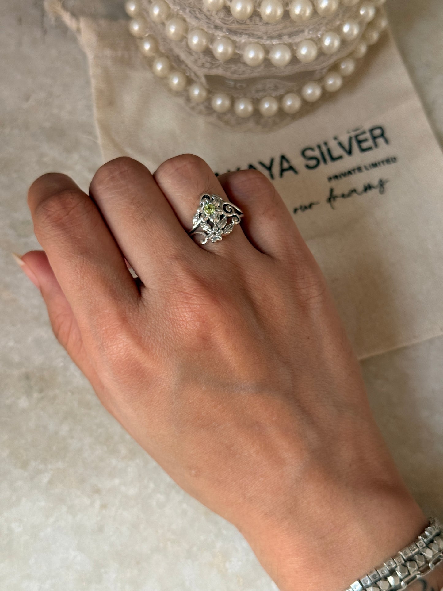 Nature-inspired peridot leaf forest ring in 925 sterling silver