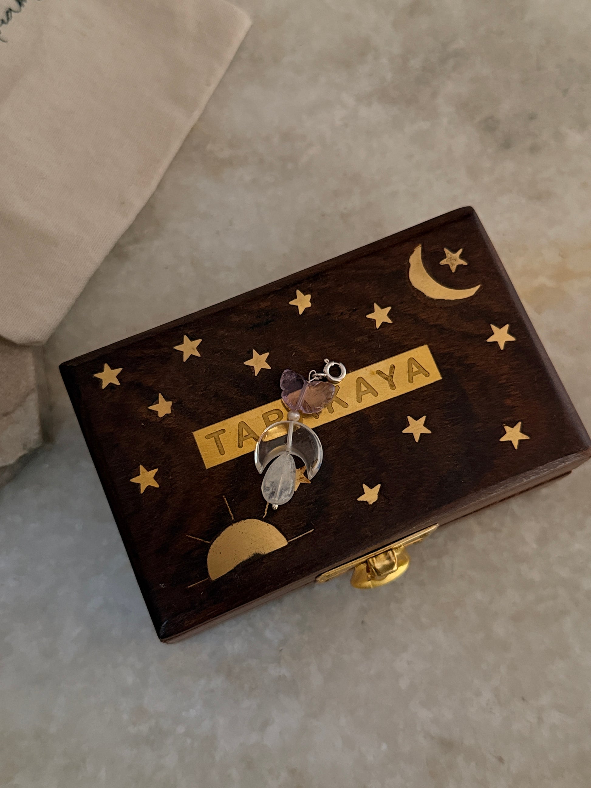 925 Sterling Silver Amethyst, Clear Quartz Moon & Moonstone Charms on decorative wooden box.
