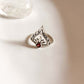 Bohemian crown silver ring adorned with garnet gemstone