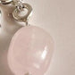 Handcrafted silver pendant featuring a rose quartz tumble charm