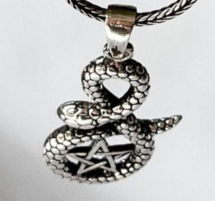 Sterling silver pendant featuring a snake and pentacle