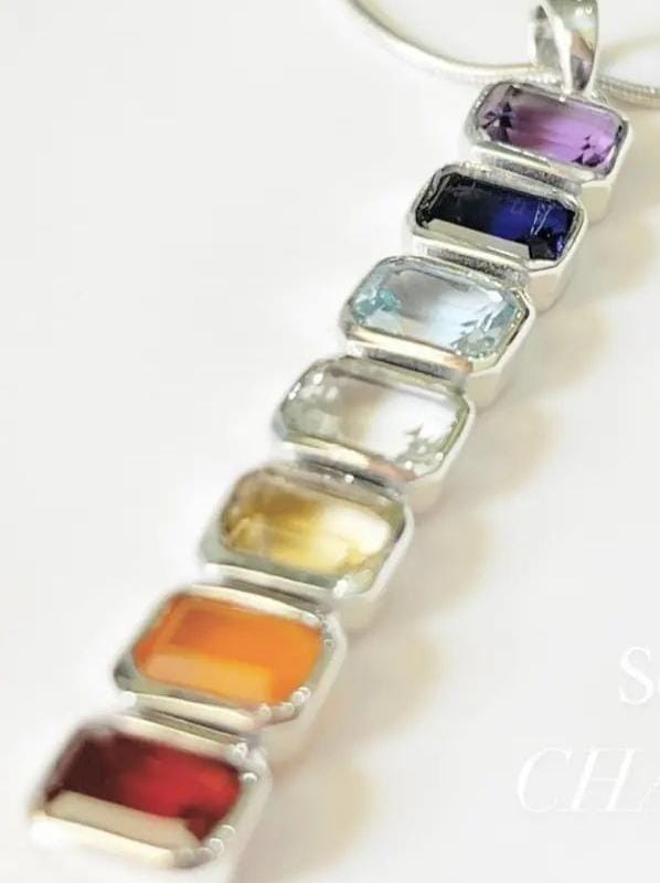 Elegant seven chakra rectangular cut statement pendant in silver