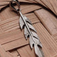 Timeless feather silver pendant featuring fine craftsmanship and soft curves