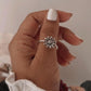Handcrafted daisy silver ring with elegant, floral charm