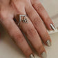 Stackable V-shaped silver ring with vintage design