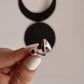 Sterling silver ring featuring abstract sculpture details
