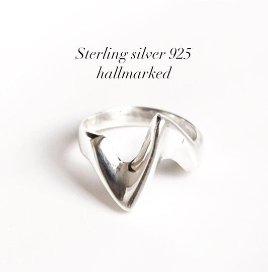 Abstract sculpture silver ring with unique design