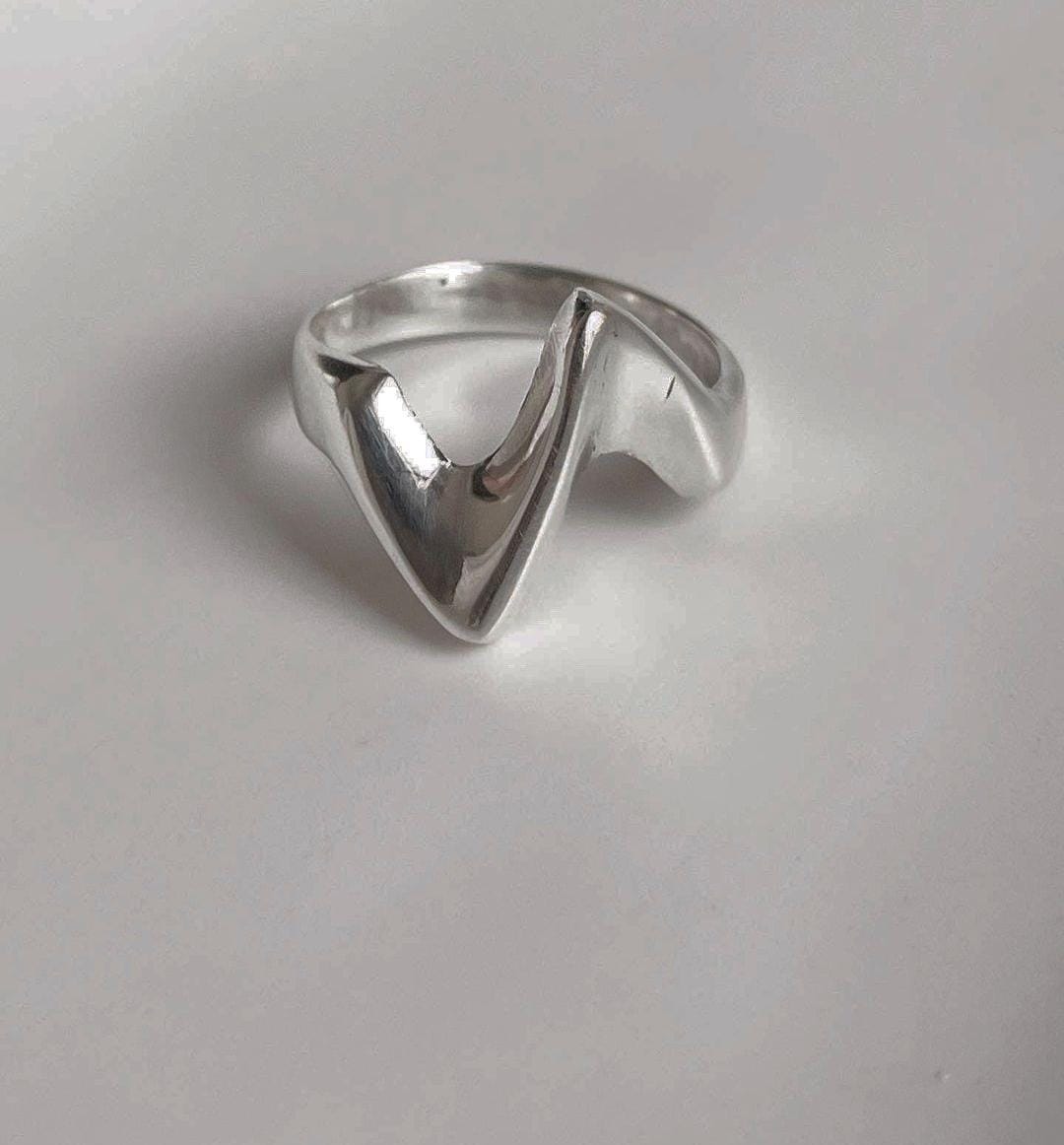 Timeless abstract sculpture ring in sterling silver