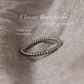 Elegant silver rope band ring, perfect for stacking