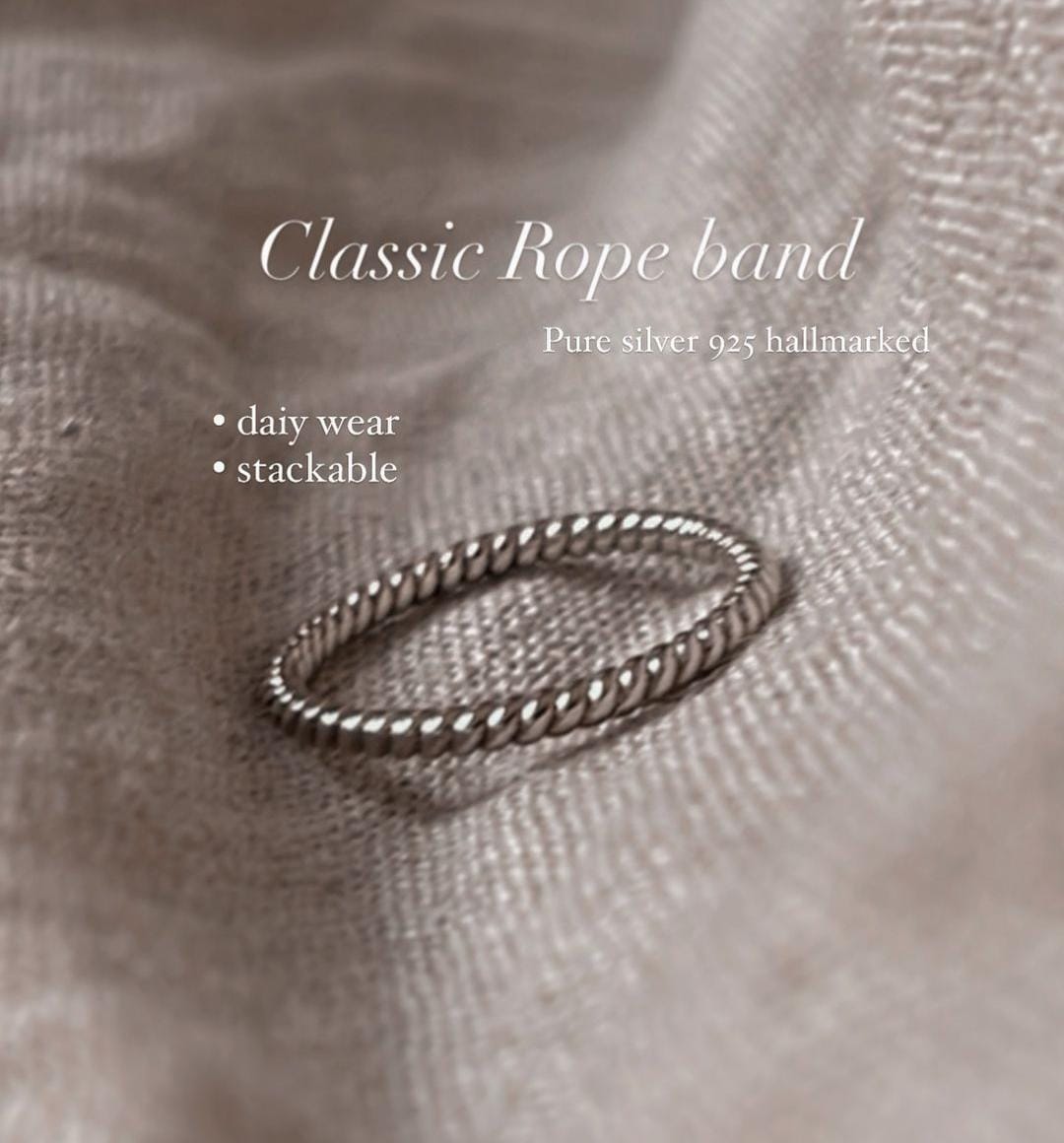 Elegant silver rope band ring, perfect for stacking