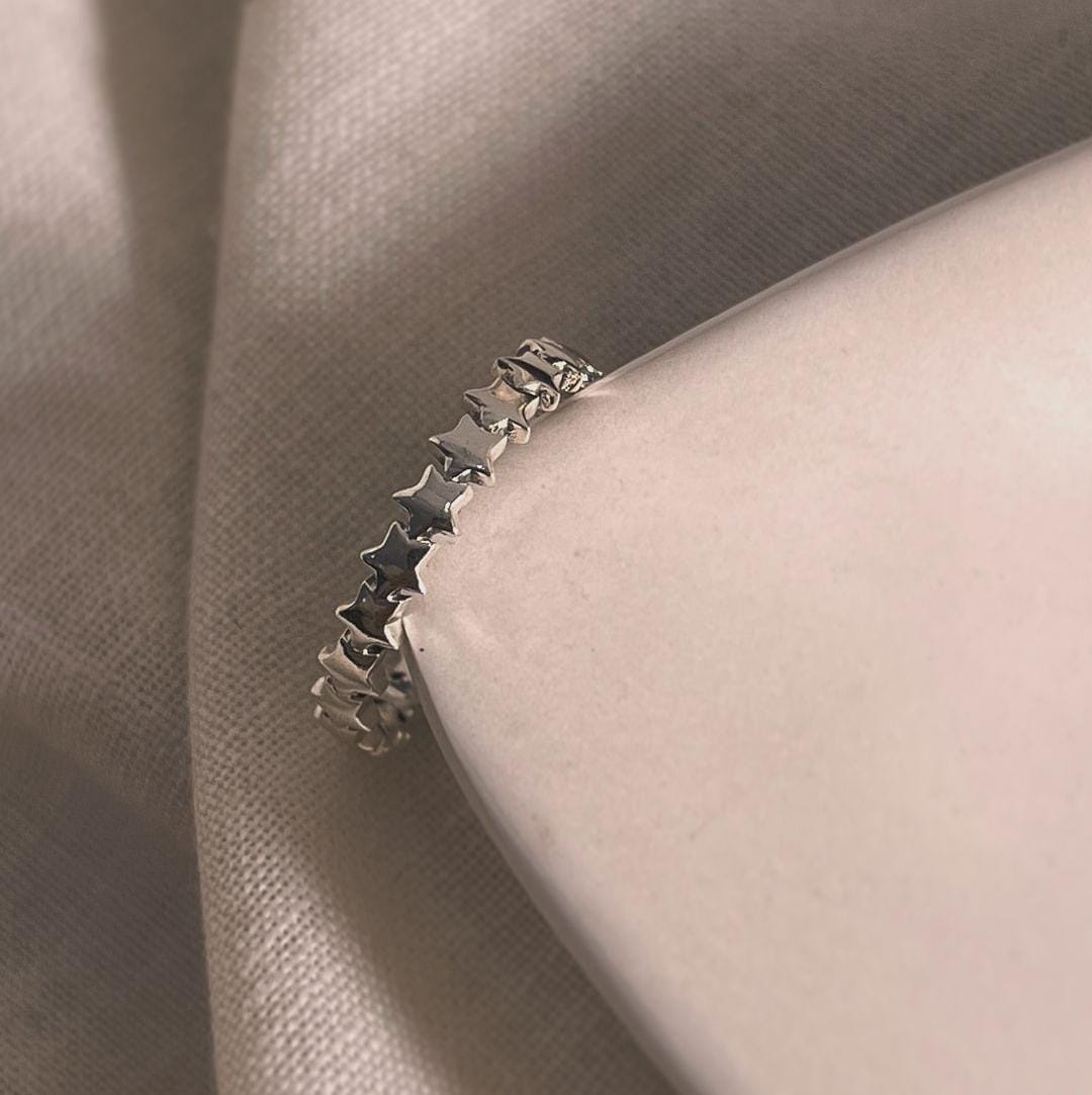 Sterling silver ring with tiny star band detail