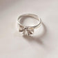Sophisticated Silver Ring Featuring Bow Motif