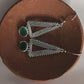 Charming green onyx triangle earrings with tribal detailing