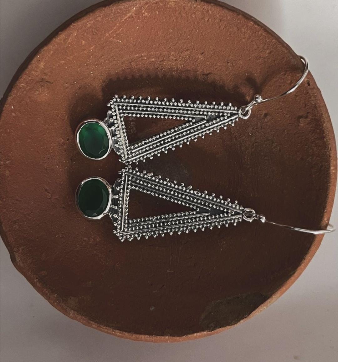 Charming green onyx triangle earrings with tribal detailing