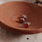 Tiny 4mm carnelian studs with classic silver setting