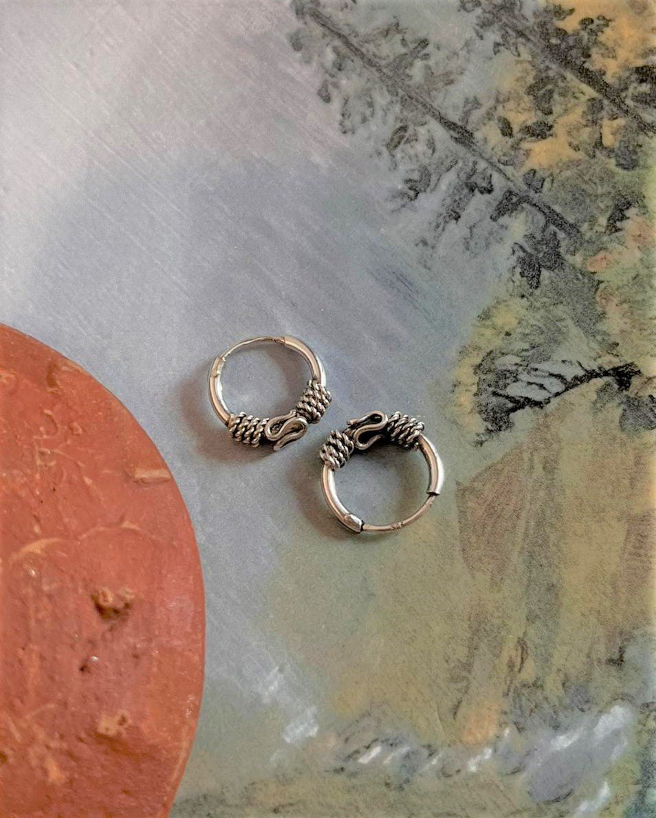 Timeless antique silver hoops with unique design 3.