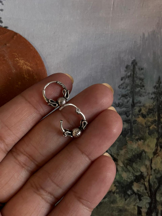 Elegant antique silver hoop earrings with intricate design 6.