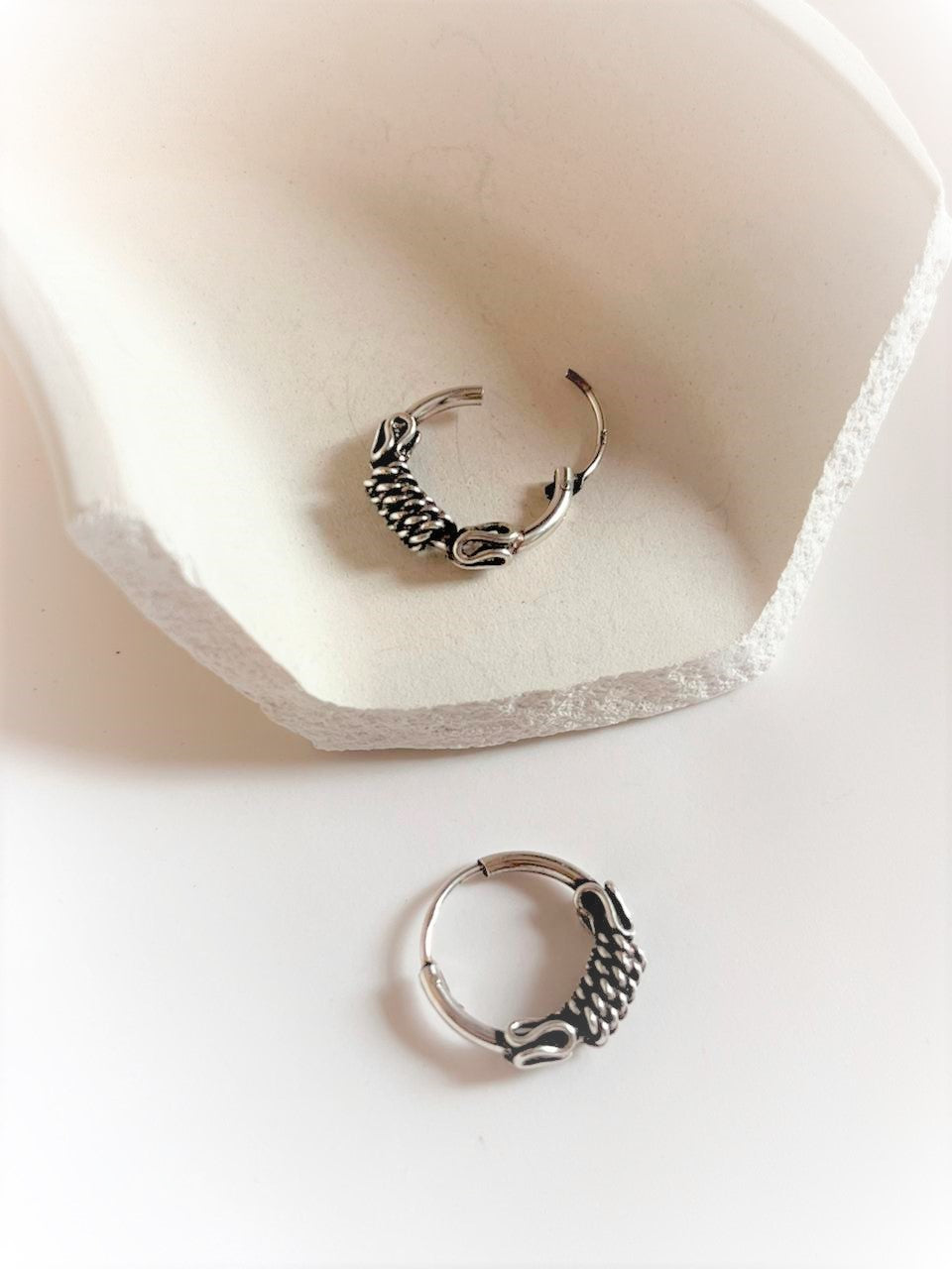 Classic design 4 antique silver hoop earrings for a sophisticated look.