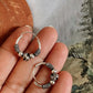Elegant antique silver hoop earrings with intricate design 8.