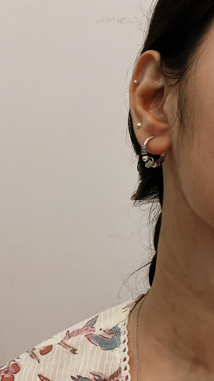 Handcrafted antique silver hoop earrings with a stunning design 8.