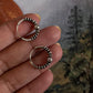 Vintage-style silver hoops featuring detailed design 5.