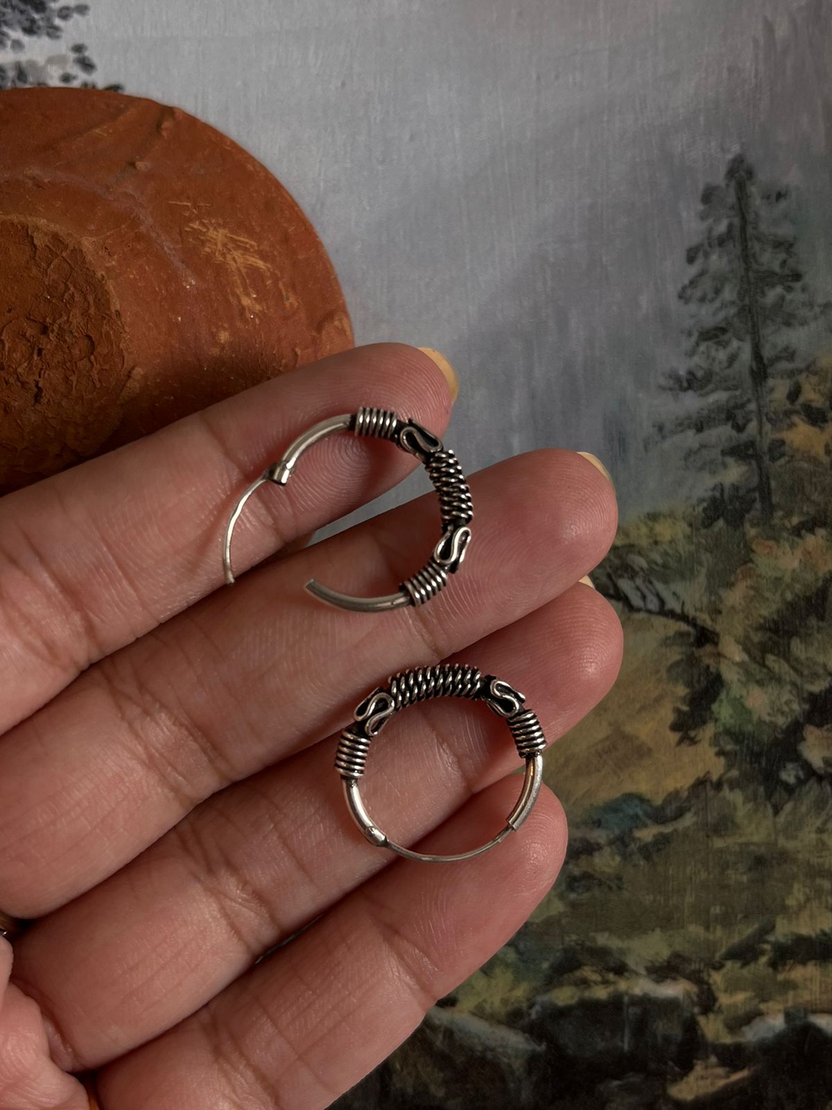 Timeless antique silver hoops with unique design 7 for a classic look.